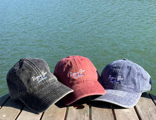 Nautical cap hats Rogue Sea against water