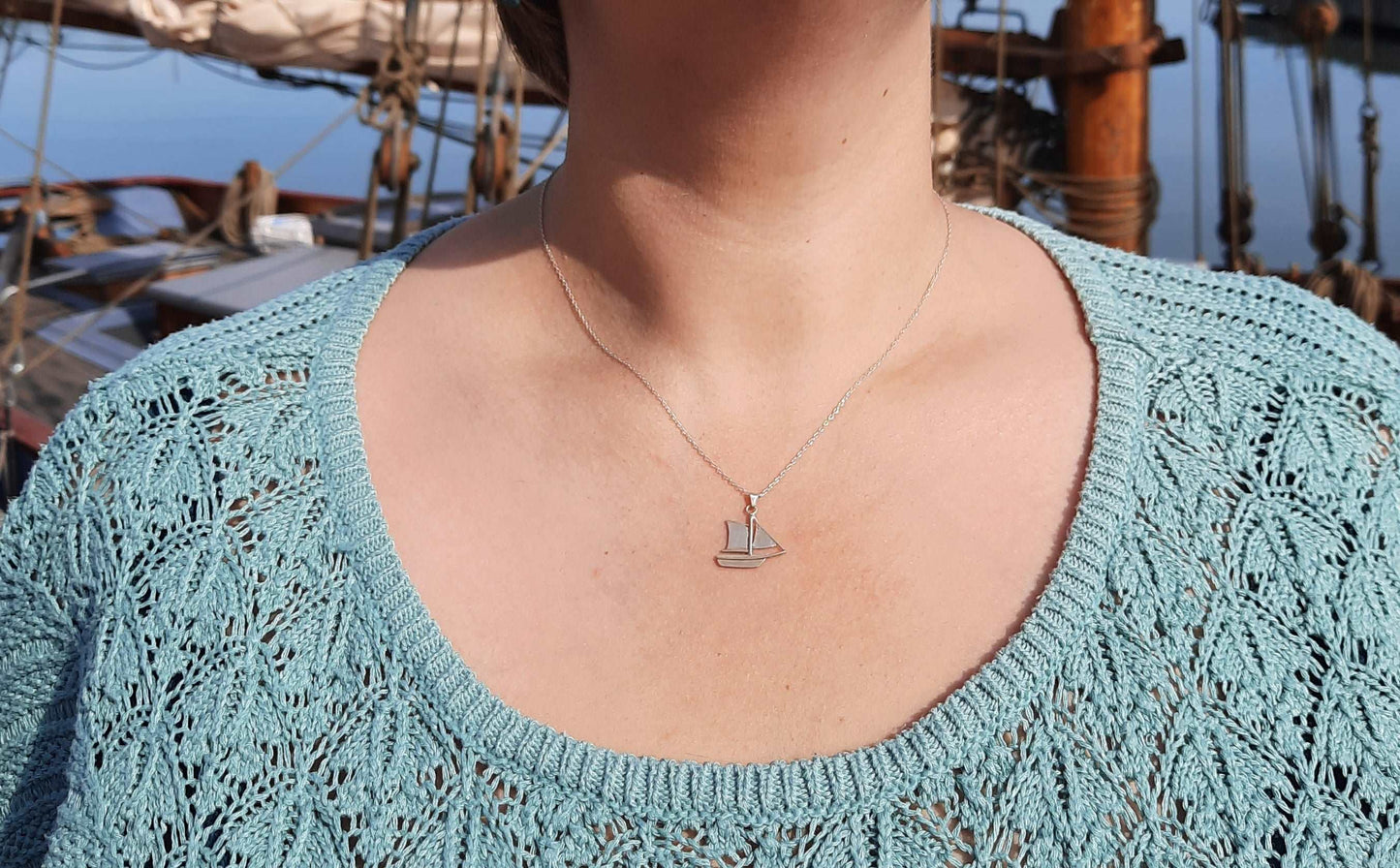 Silver sailing boat necklace