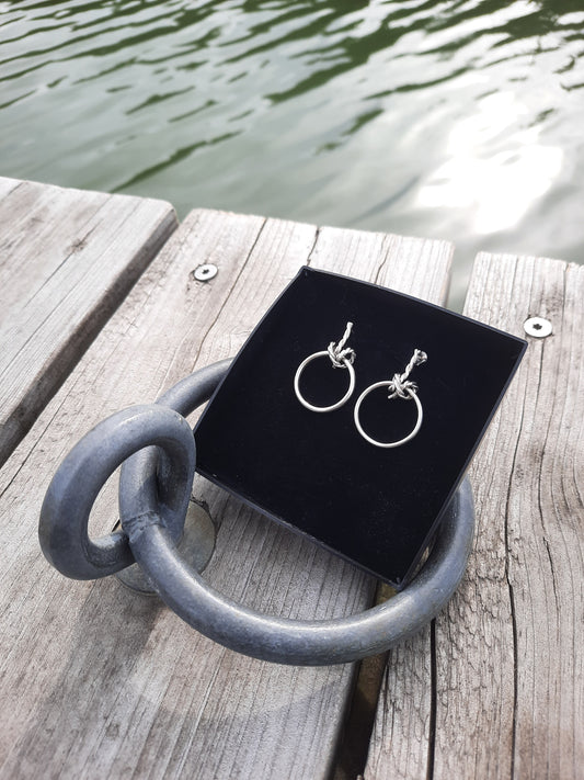 Silver Mooring Ring earrings on dock